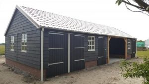 Cape cod garage met berging en veranda in Julianadorp