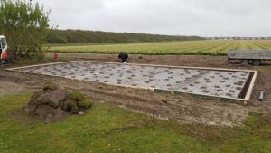 betonvloer cape cod garage met veranda in Julianadorp