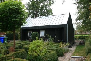 luifel cape cod garage met zinken felsdak in Kollum